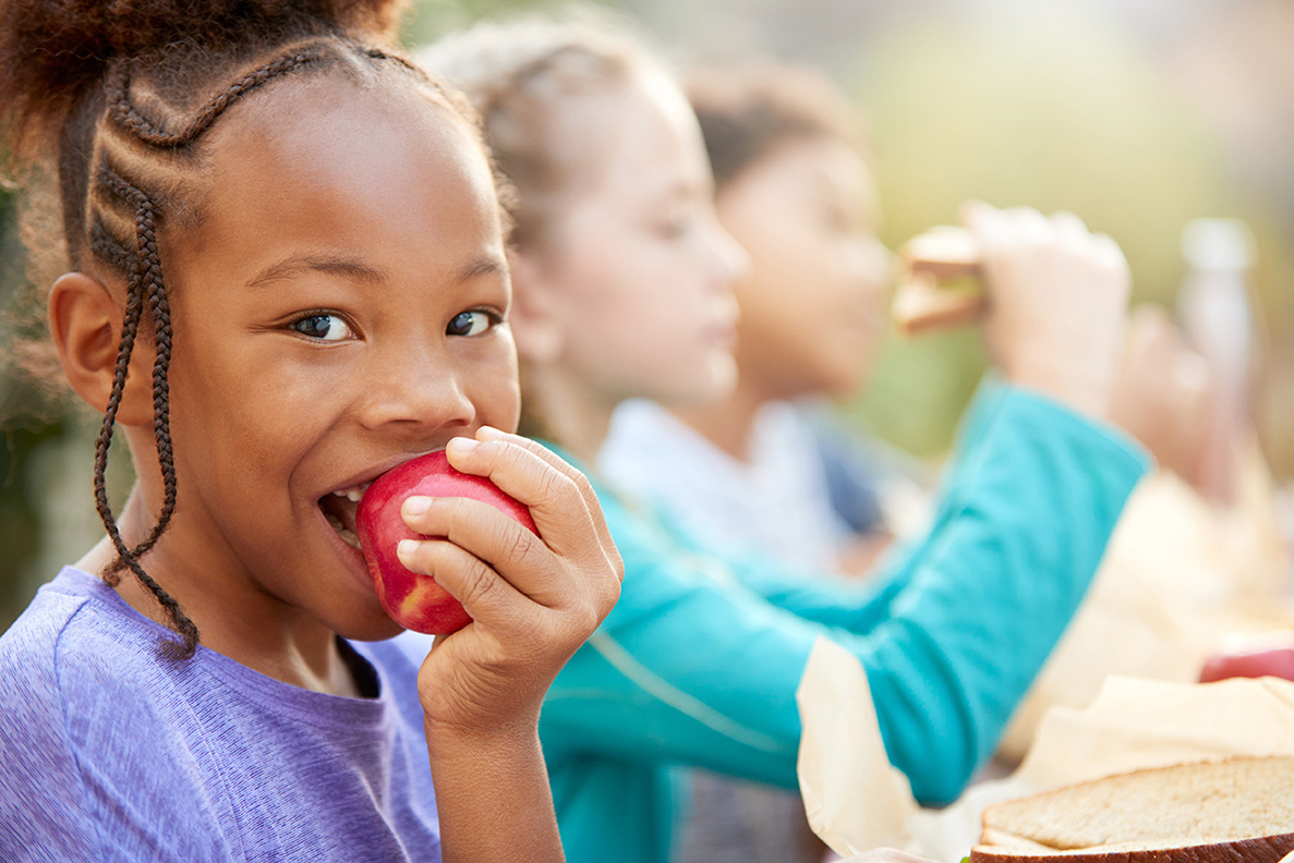 Child eating apple